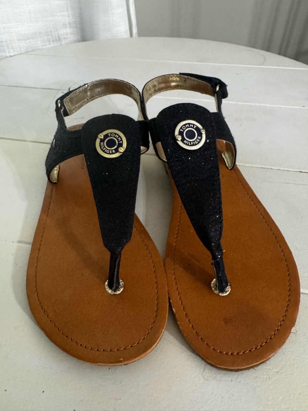 Tommy Hilfiger Black and Tan T‑Strap Sandals